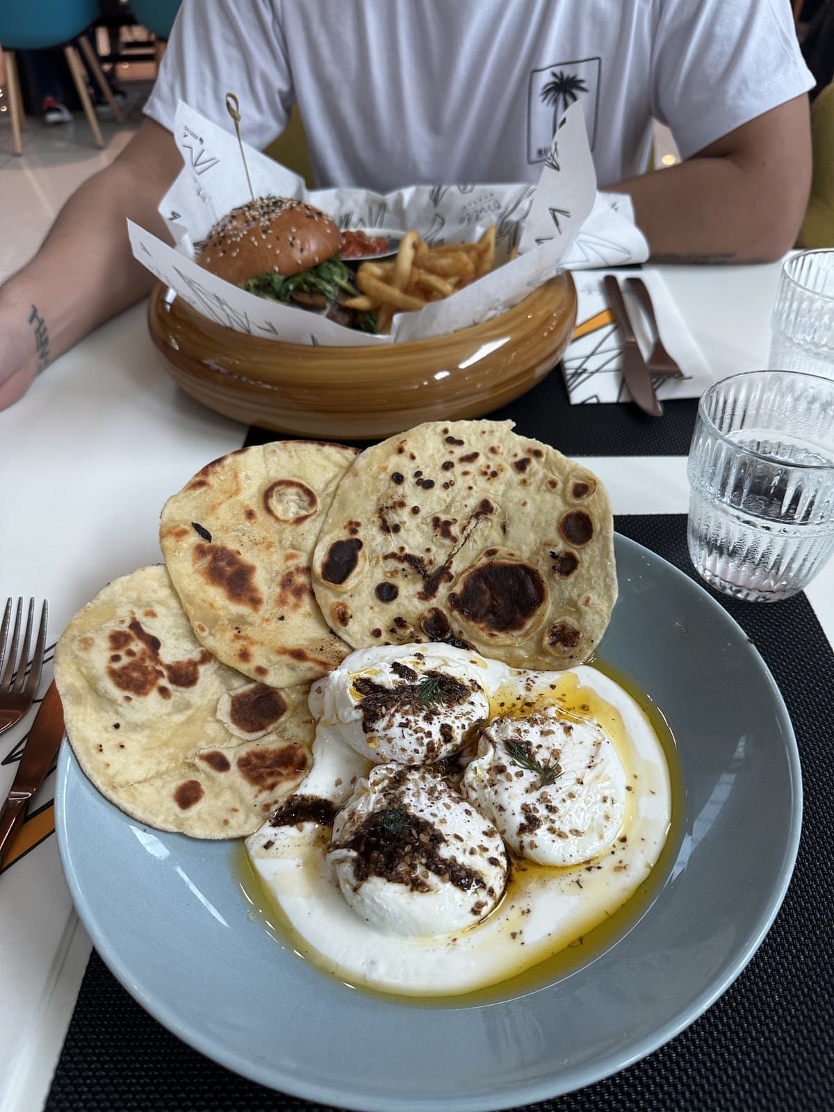 Brunch at Bruttito: Mediterranean eggs with flatbreads, and an Angus burger with fries