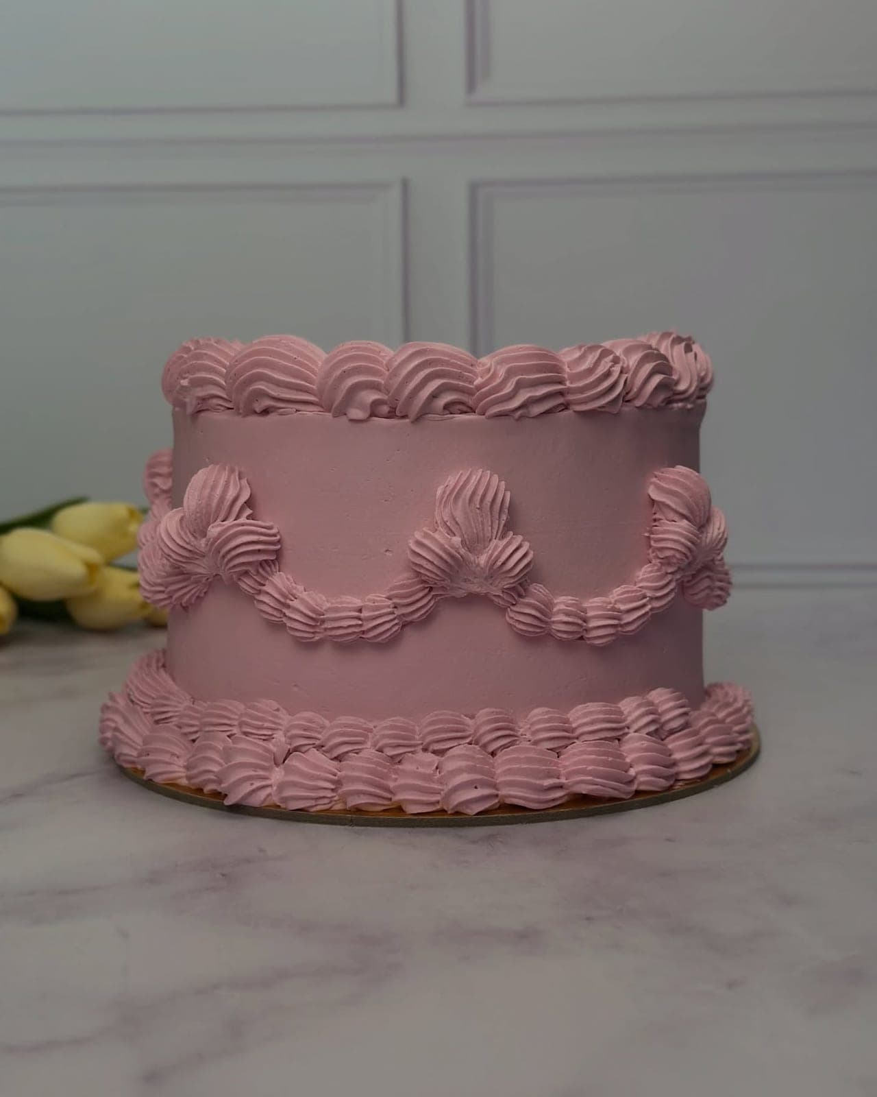 Pink buttercream cake at Anora Coffee & Bakery, Panama City