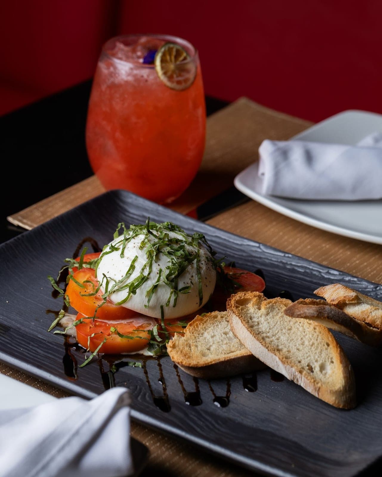 Burrata di bufala with tomatoes and basil at Assisi Restaurant, Obarrio, Panama City