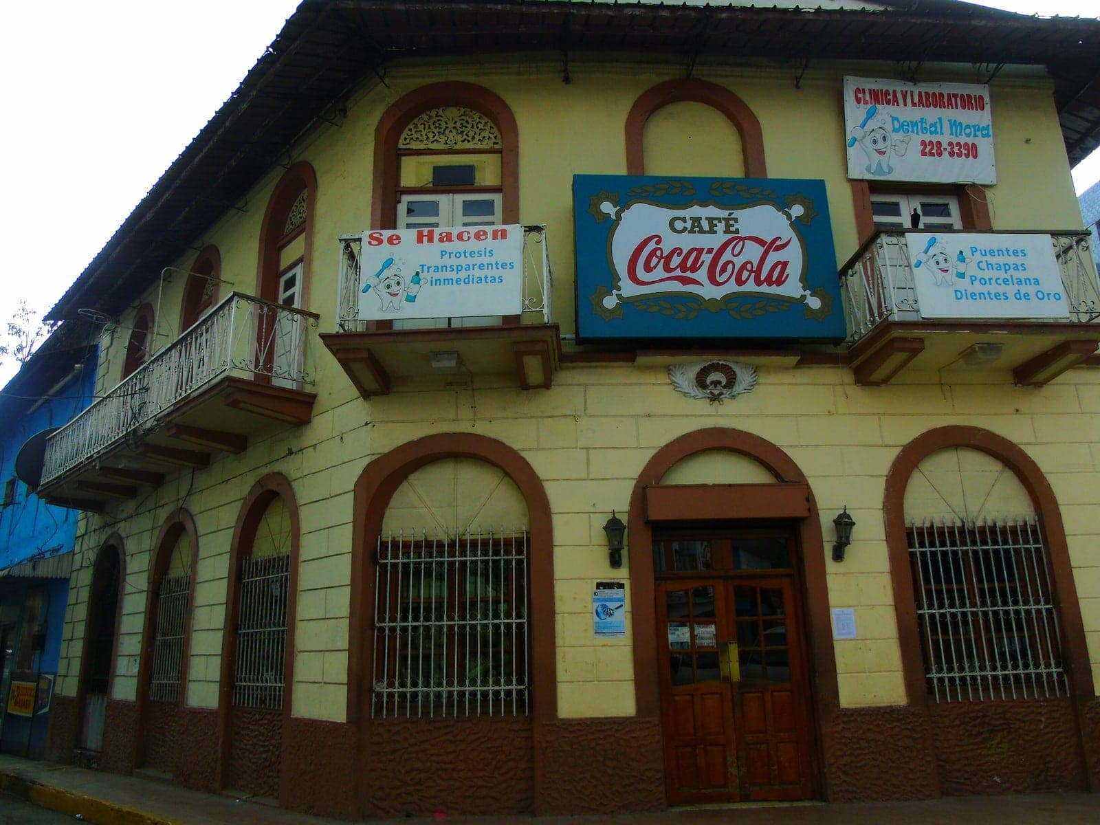 The historic yellow corner building of Café Coca Cola in Casco Viejo / Santa Ana, Panama City