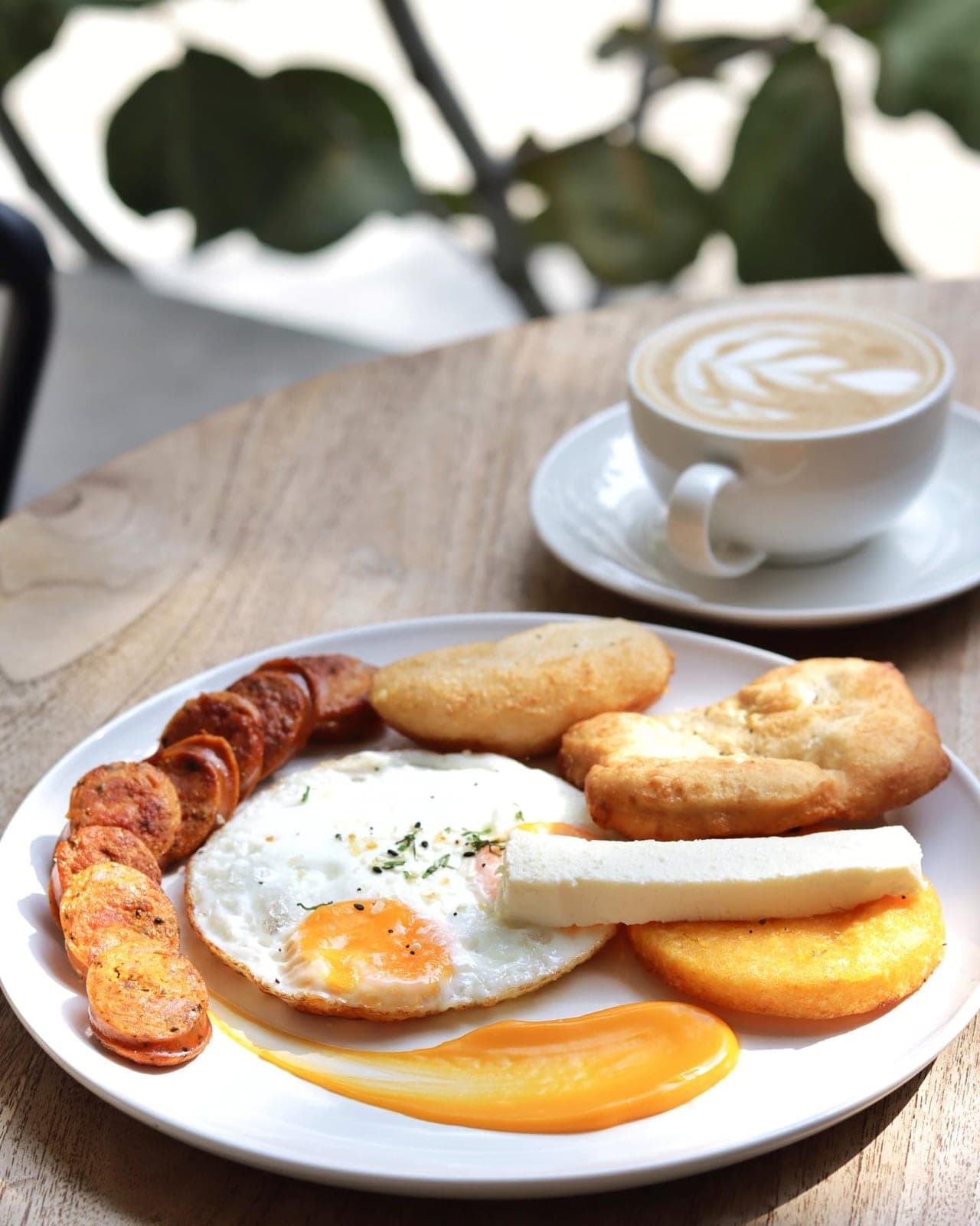 Panamanian breakfast plate with coffee at Nacion Lirica, Santa Ana, Panama City