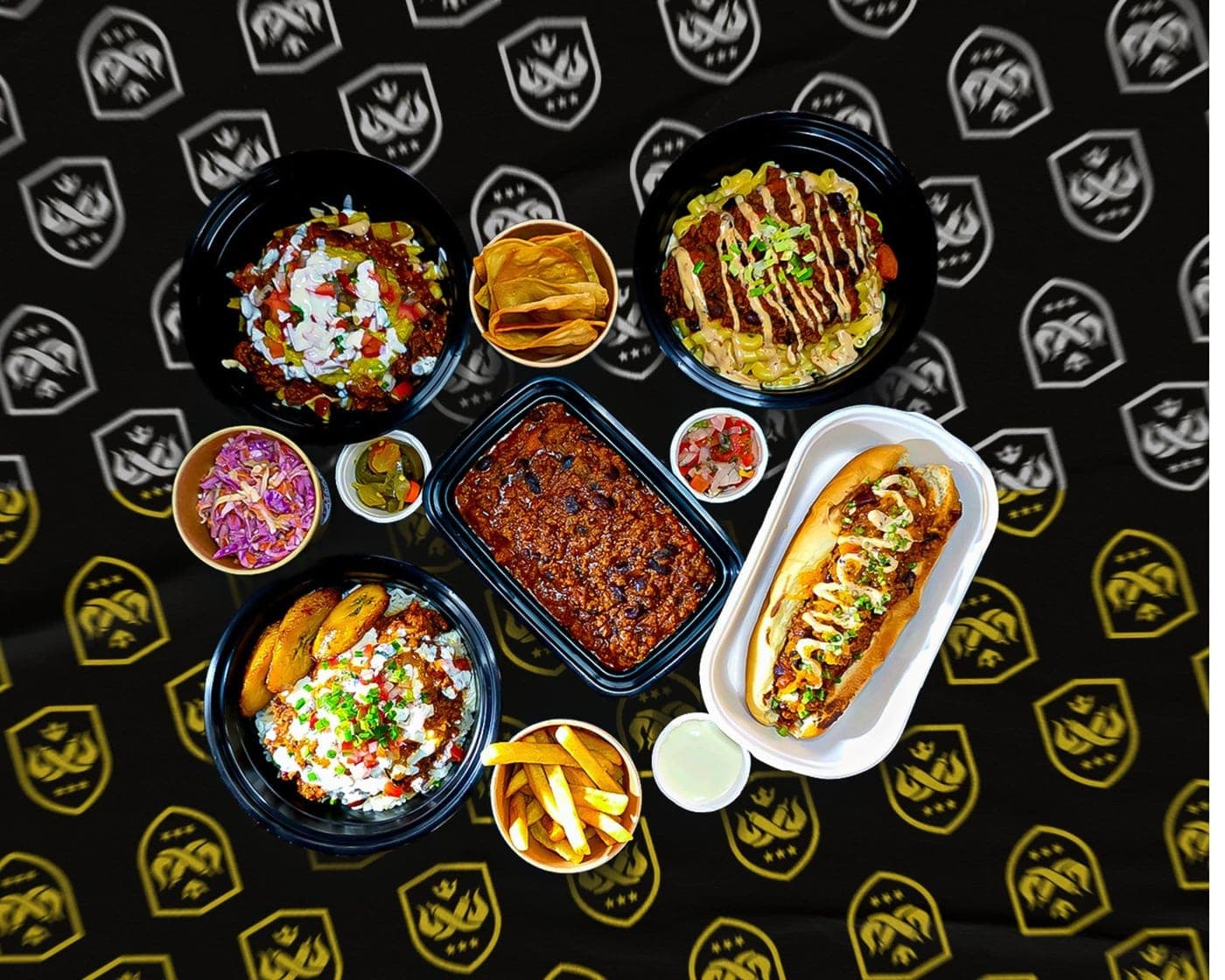 spread of tacos, loaded hot dog and sides at Chilli Republic, Panama City