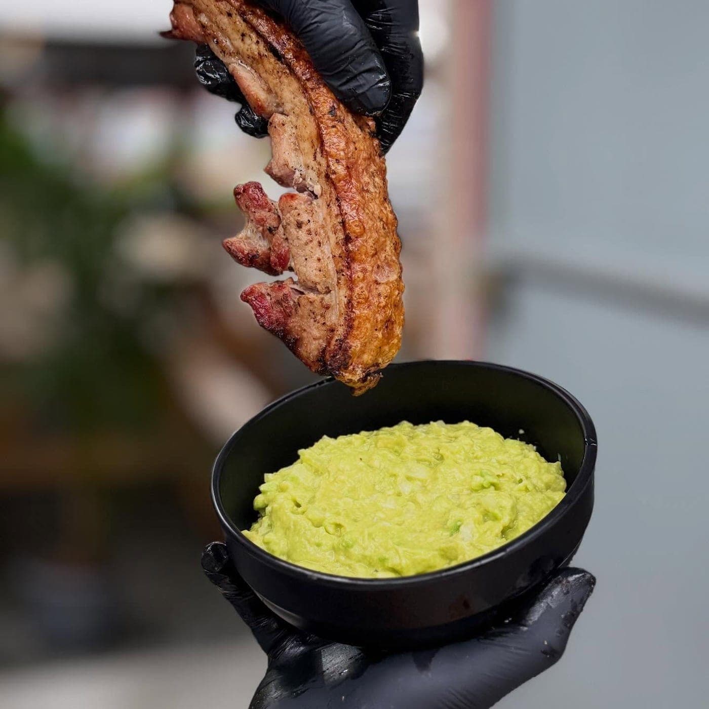 Grilled pork belly with guacamole at Delilocos, El Cangrejo, Panama City
