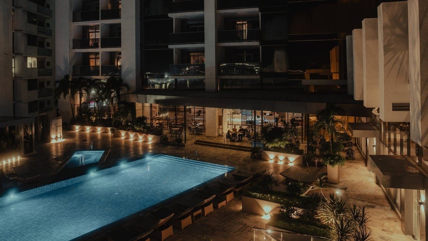 Pool and terrace bar at night at Hilton Panama, Bella Vista, Panama City