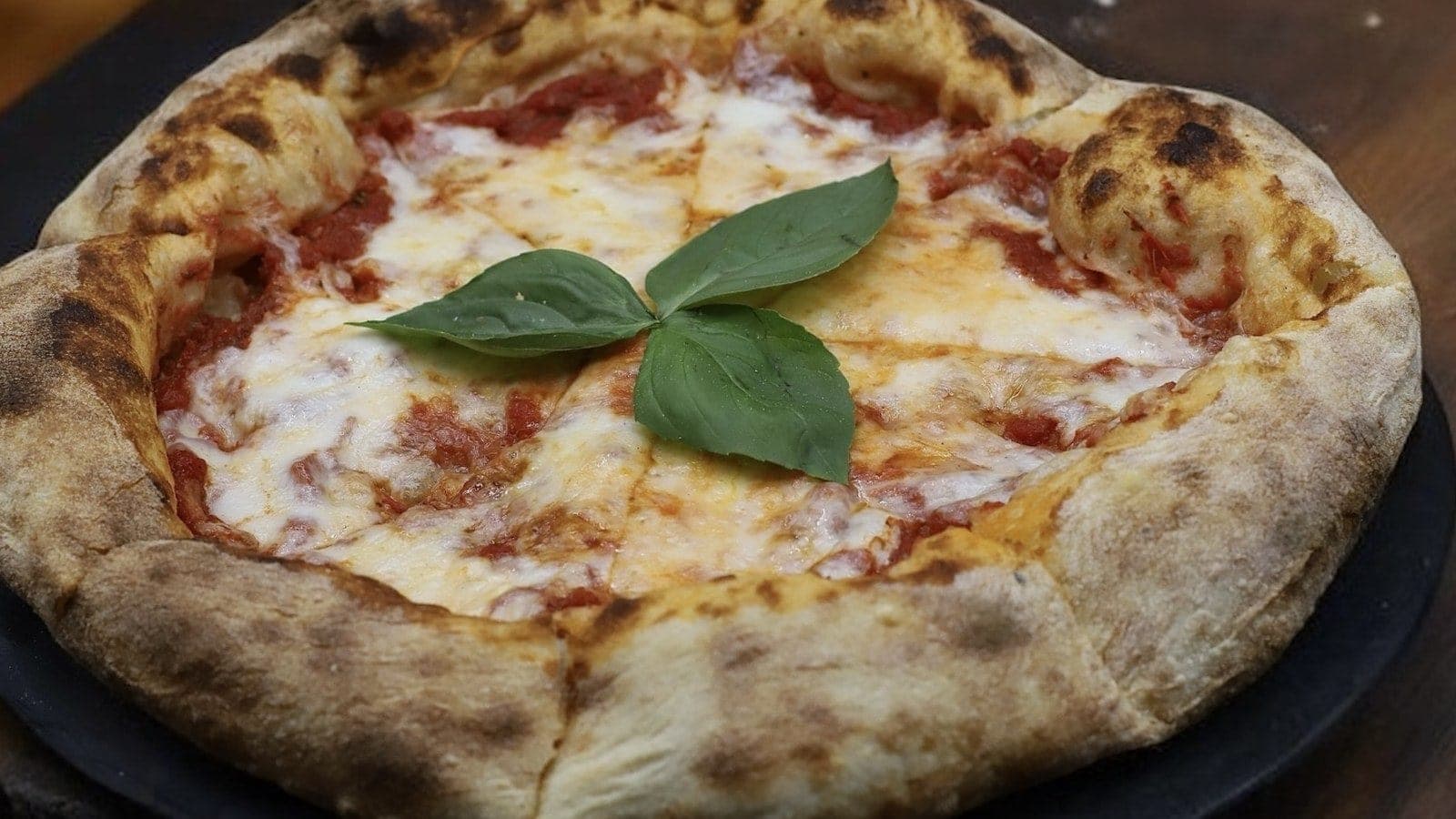 Fresh Margherita pizza with basil at Il Padrino Pizzeria, Casco Viejo, Panama City