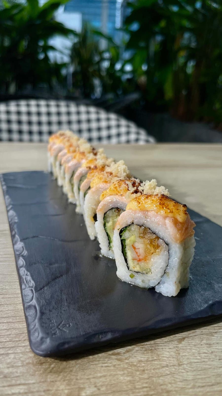 Salmon-topped sushi roll at KAVA, El Cangrejo, Panama City