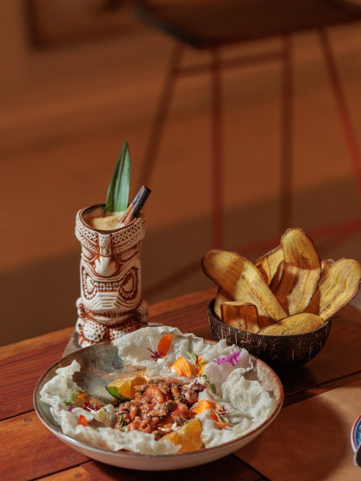 Seafood ceviche with plantain chips and a cocktail at KILIAN Restaurant, San Francisco, Panama City