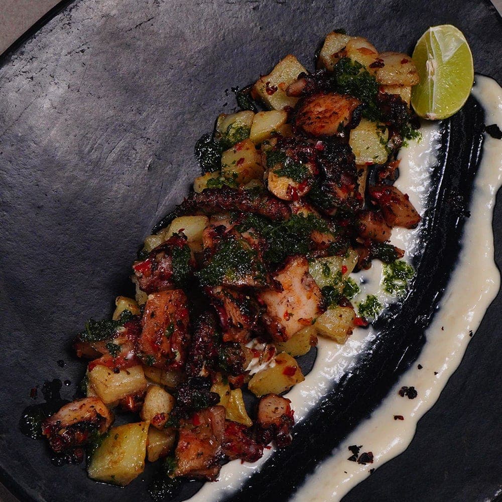 Grilled octopus with roasted potatoes and chimichurri at La Pulpería, Casco Viejo, Panama City