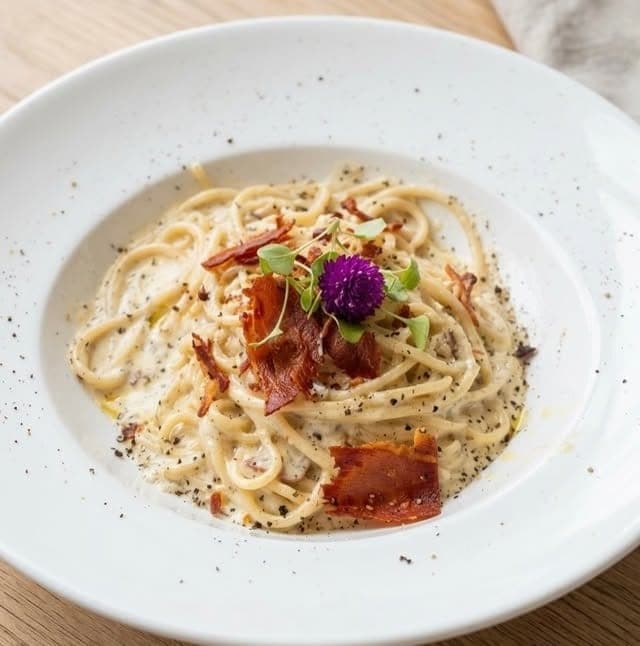 Creamy Spaghetti Bianca Luna with crispy prosciutto at La Scarpetta Ristorante, Bella Vista, Panama City