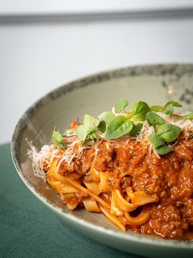 Tagliatelle bolognese with basil and shaved cheese at Madre Cucina Italiana, Casco Viejo, Panama City
