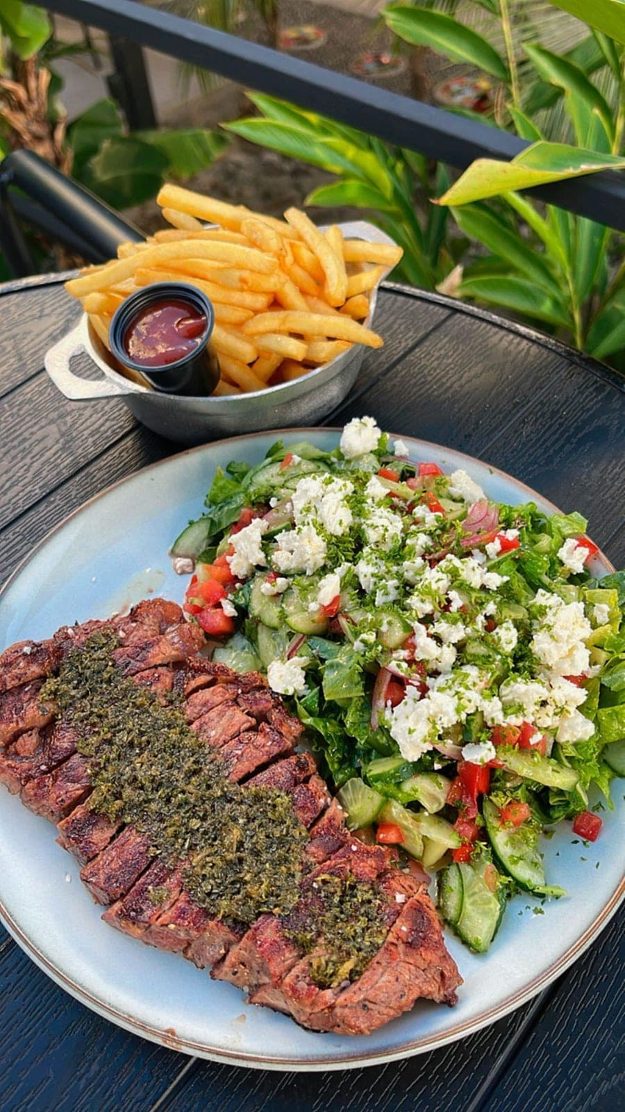 Steak, salad and fries at The Yard, San Francisco, Panama City